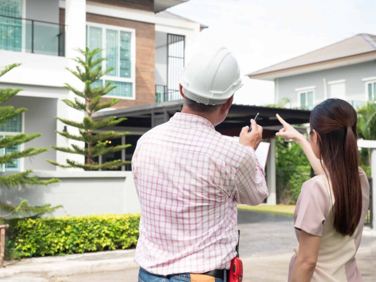 owner-engineer-inspecting-new-house-front-1