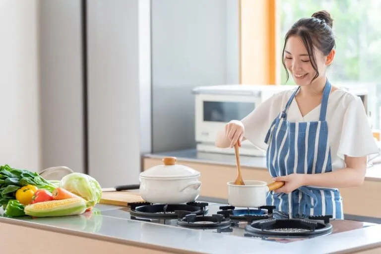 attractive-asian-woman-cooking-kitchen-1
